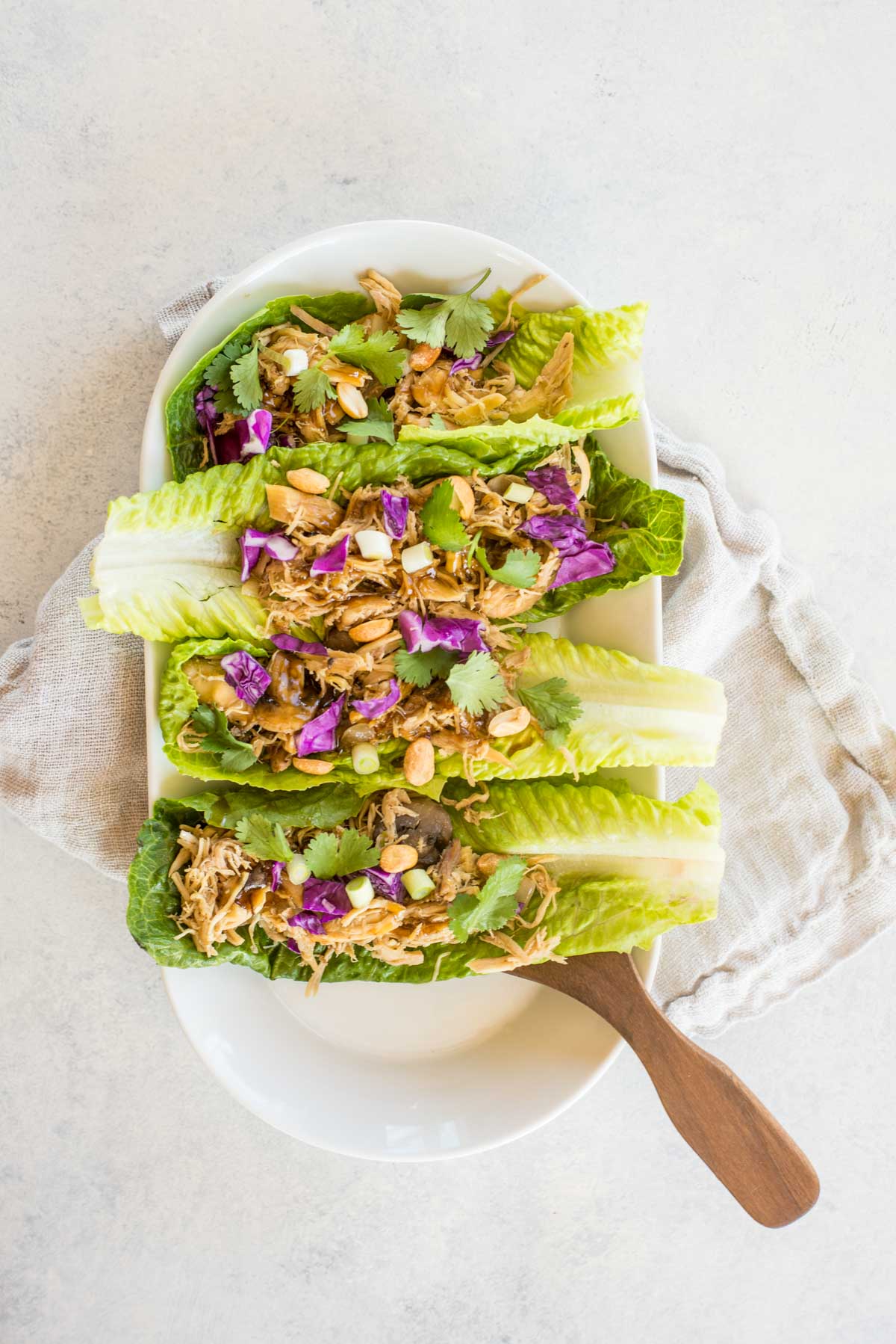 This recipe takes healthy to the next level with flavorful delicious Asian Chicken Lettuce Wraps.