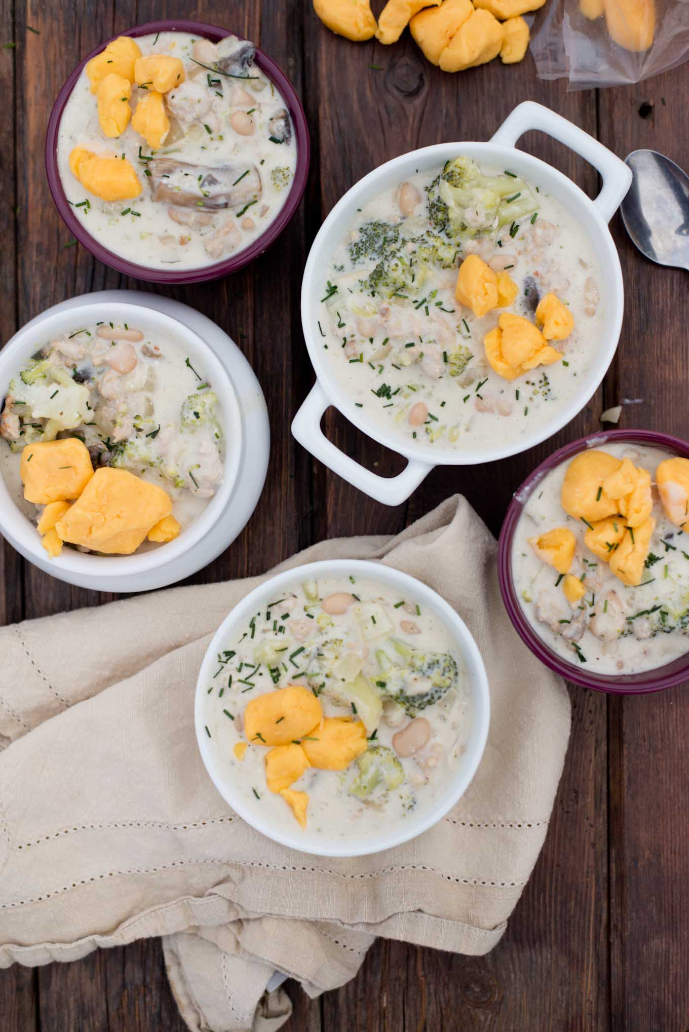 Creamy and delicious this healthified version of broccoli cheddar soup has half the cheese and extra protein.