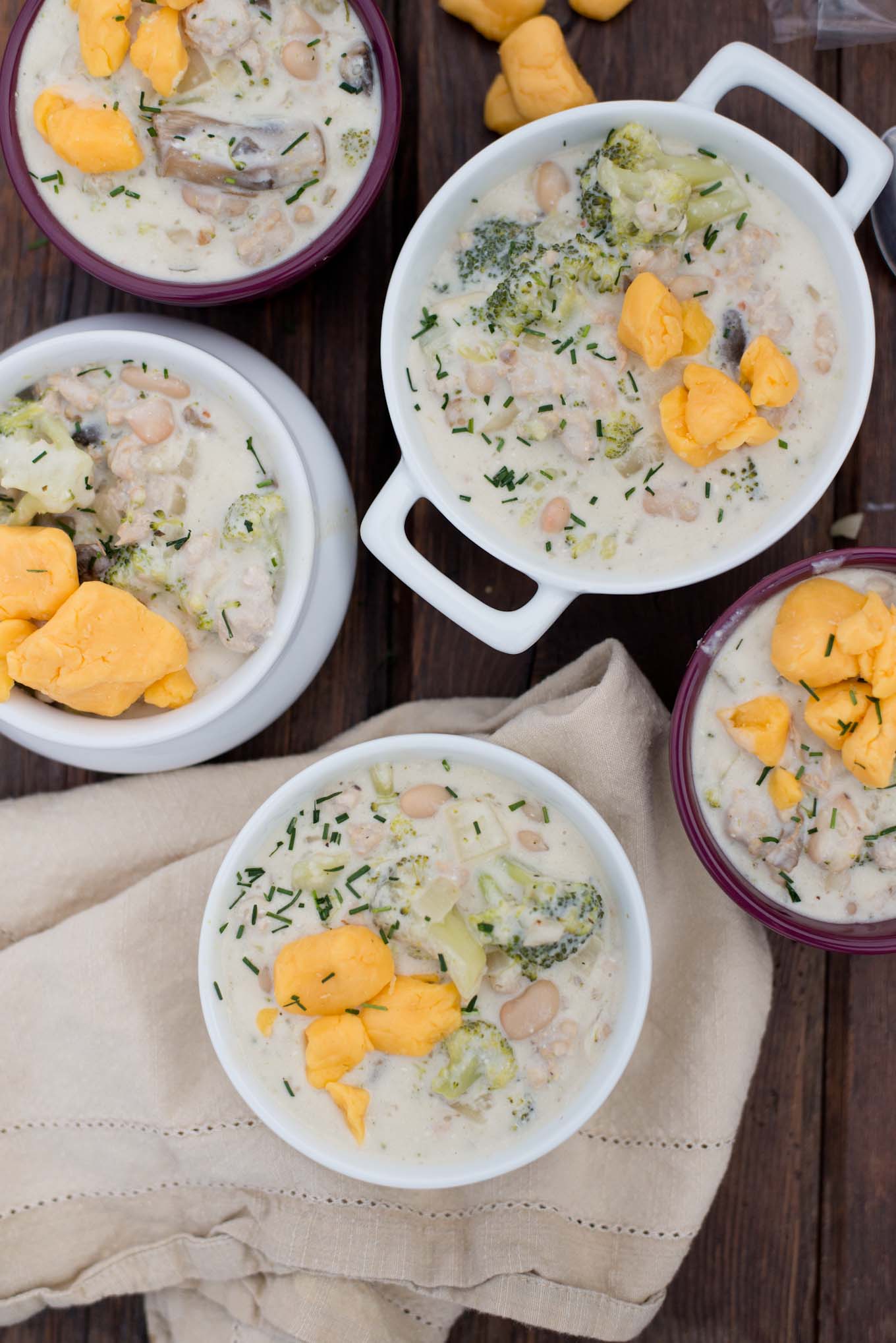 Creamy and delicious this healthified version of broccoli cheddar soup has half the cheese and extra protein.
