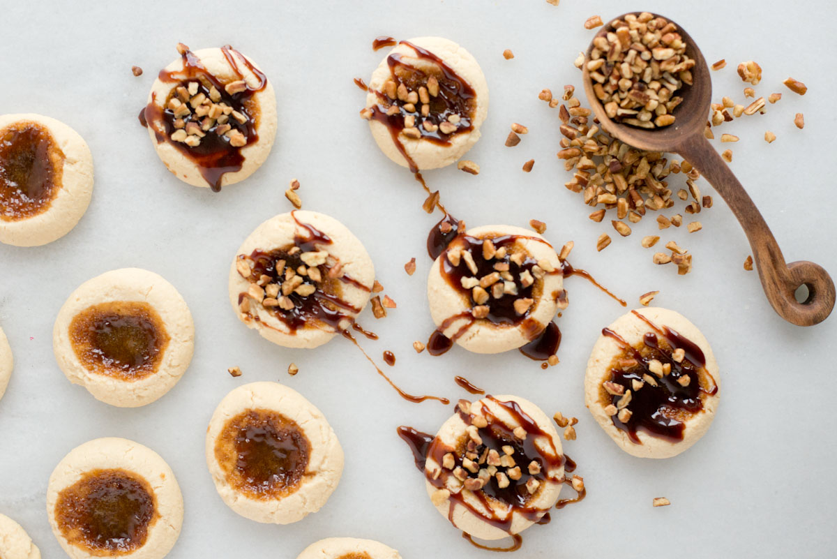 Looking for a healthier cookie recipe? Look no further than these thumbprint cookies that are gluten-free and paleo. Click to find out more!