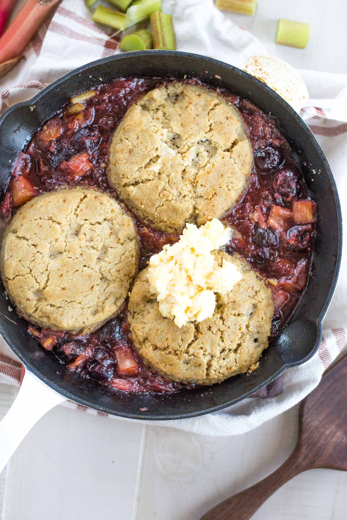 Looking for something delicious? Try this, it's the best cherry rhubarb cobbler with honey buttered biscuits. Seriously it's that good. 