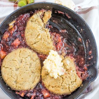 Looking for something delicious? Try this, it's the best cherry rhubarb cobbler with honey buttered biscuits. Seriously it's that good.
